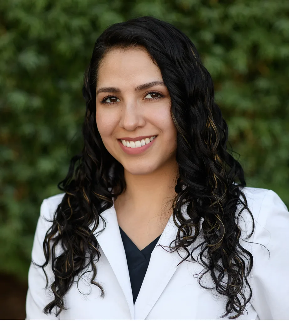 Dr. Mitzi Arcos
